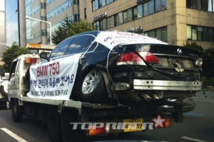 1억8천짜리 '박살난 BMW', 강남 도로 누비는 까닭